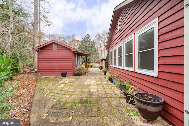 view of property exterior featuring a patio