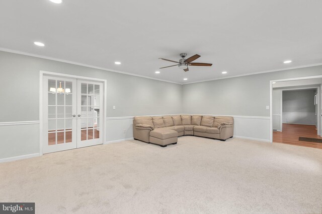 living room featuring french doors, ceiling fan, and ornamental molding