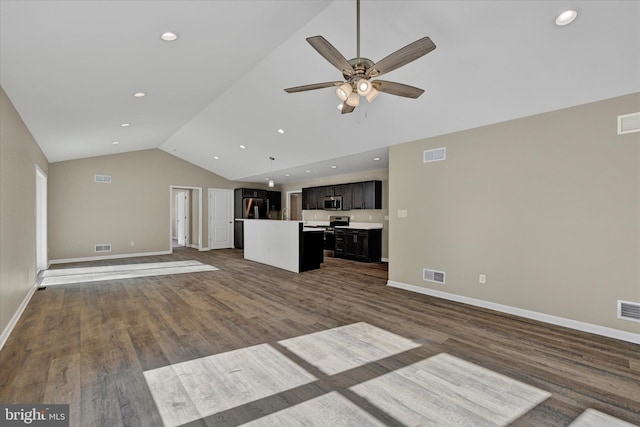 unfurnished living room with ceiling fan, lofted ceiling, and dark hardwood / wood-style flooring