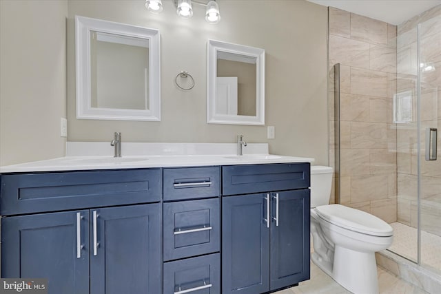 bathroom with walk in shower, vanity, and toilet