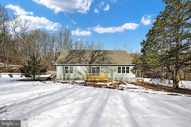 view of front of house with a wooden deck