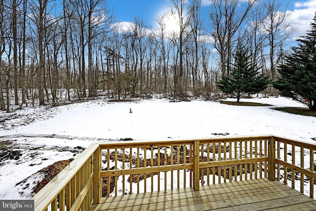 view of snow covered deck