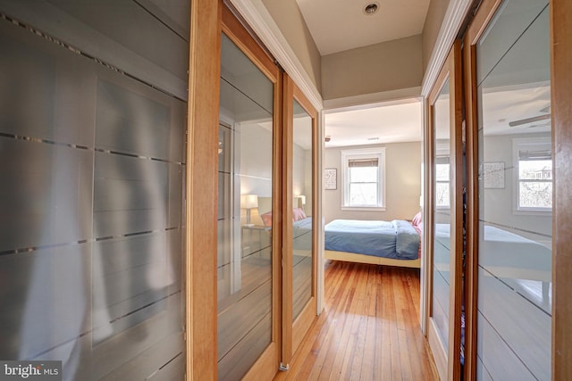 hallway with light wood-type flooring