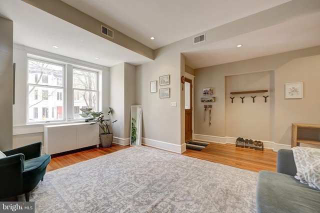 living area featuring light hardwood / wood-style floors