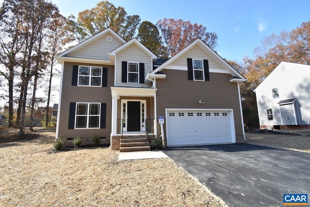 front facade with a garage