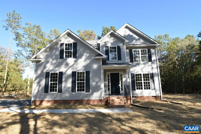 view of front facade with a front yard