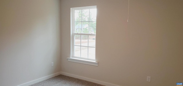 view of carpeted spare room