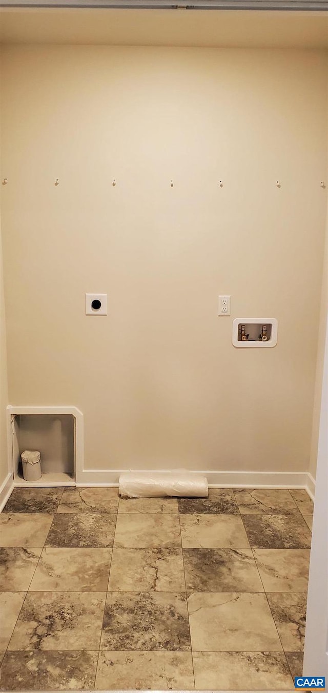 clothes washing area featuring hookup for a washing machine and electric dryer hookup