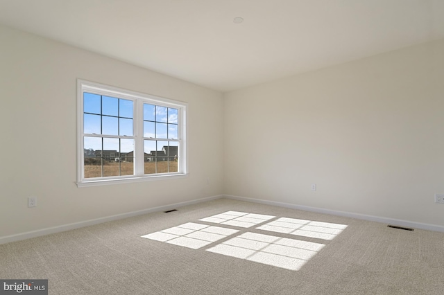 view of carpeted spare room