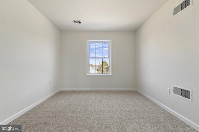 spare room with carpet flooring