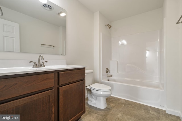 full bathroom featuring vanity, shower / washtub combination, and toilet