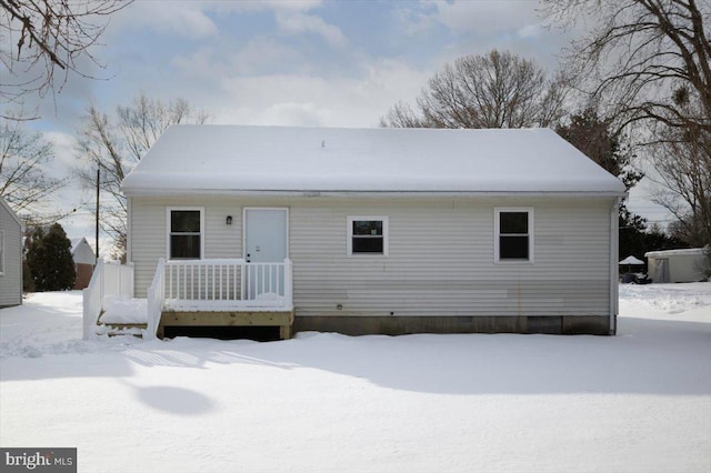 view of snow covered property