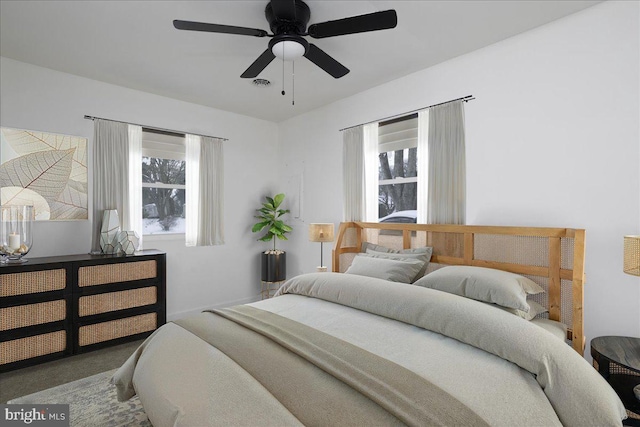 carpeted bedroom featuring ceiling fan