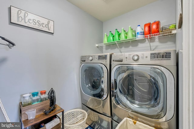 laundry room with washer and clothes dryer