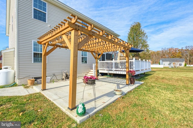 view of patio featuring a pergola and a wooden deck