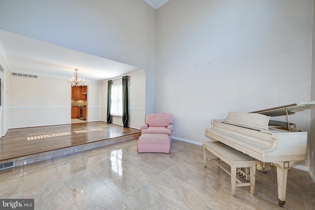 unfurnished room with ornamental molding and a chandelier