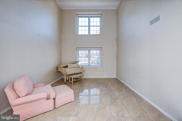 unfurnished room with ornamental molding