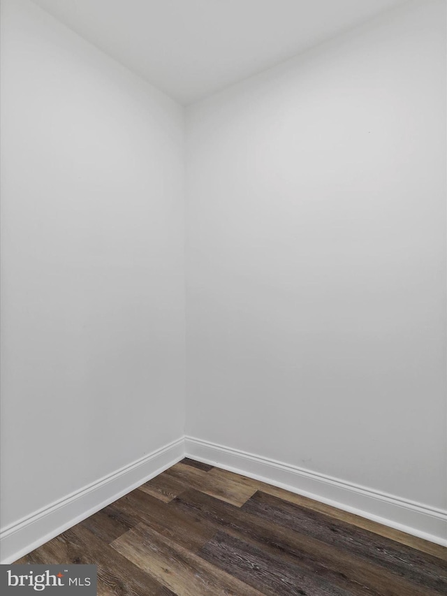 unfurnished room featuring wood-type flooring