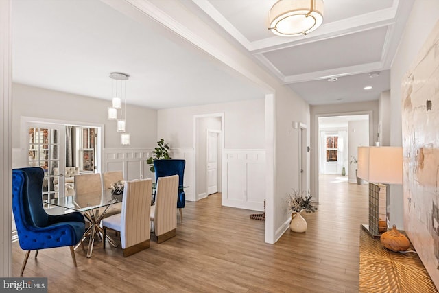 dining room with wood finished floors, beamed ceiling, a wainscoted wall, recessed lighting, and coffered ceiling