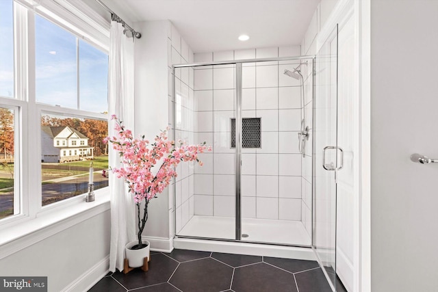full bathroom with tile patterned flooring, a shower stall, baseboards, and recessed lighting