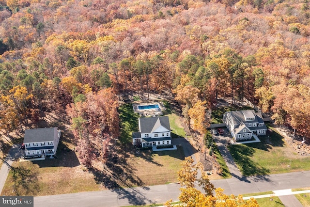 view from above of property featuring a forest