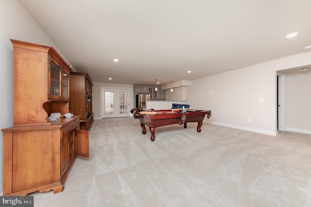 playroom featuring light colored carpet, billiards, and french doors