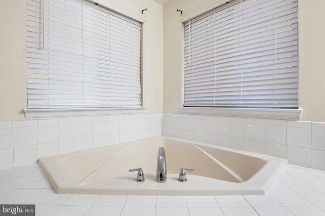 bathroom with tiled tub