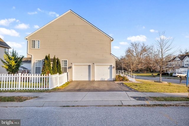 view of home's exterior with a garage