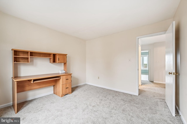 unfurnished office with light colored carpet