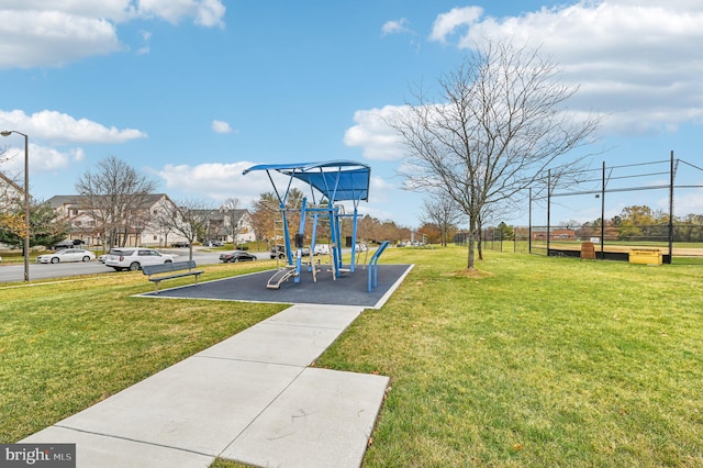 view of playground with a yard