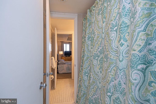 bathroom featuring tile patterned flooring