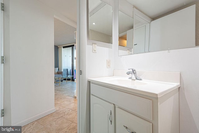 bathroom with vanity and tile patterned floors