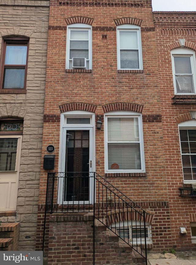 view of front of house with cooling unit