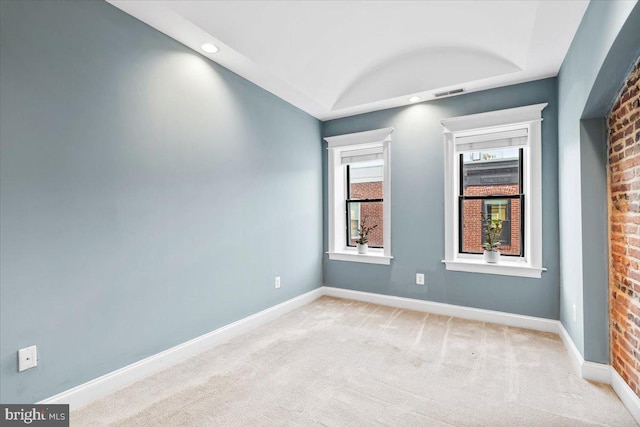 view of carpeted spare room