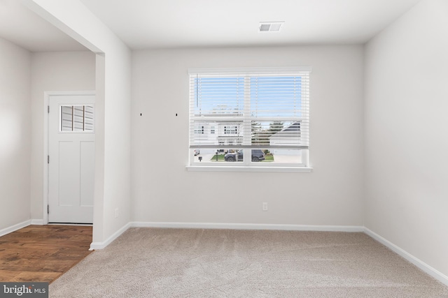 entryway with wood-type flooring