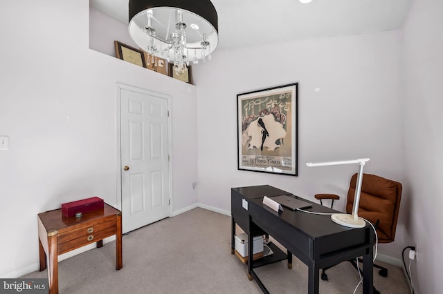 carpeted office space featuring vaulted ceiling