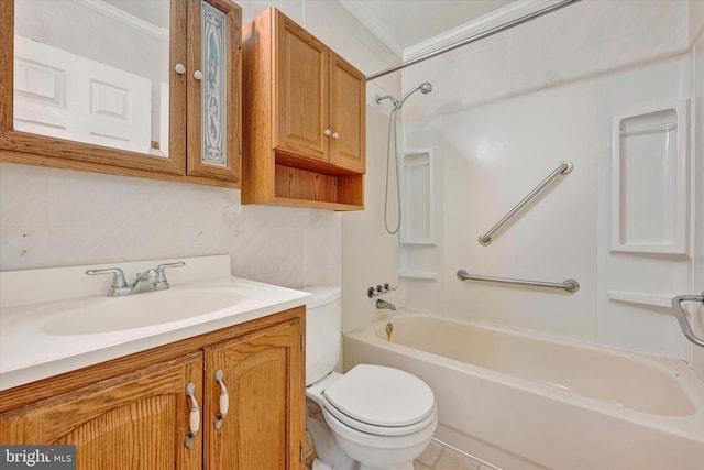 full bathroom featuring toilet, tile walls, ornamental molding, vanity, and bathtub / shower combination