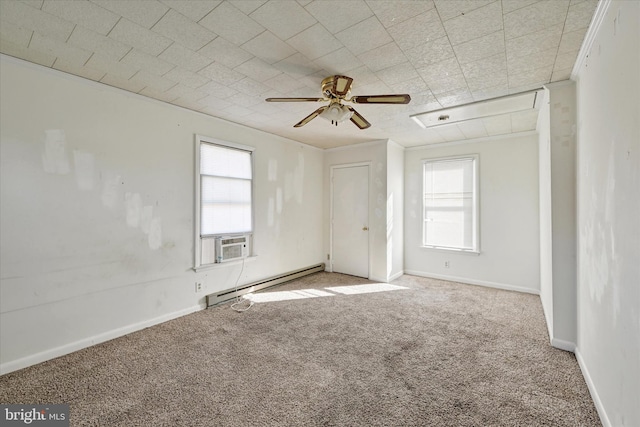 spare room featuring ceiling fan, baseboard heating, cooling unit, and carpet