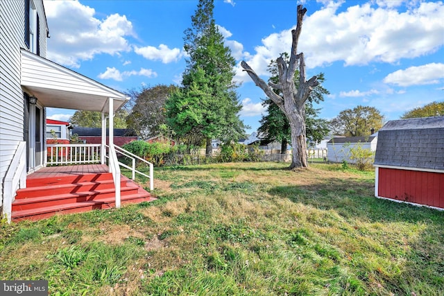 view of yard with a storage shed