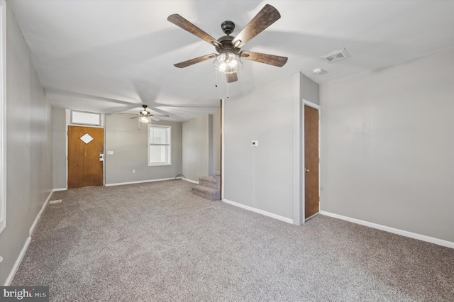 interior space featuring carpet flooring and ceiling fan