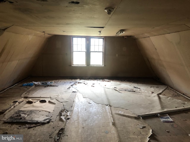 bonus room featuring lofted ceiling