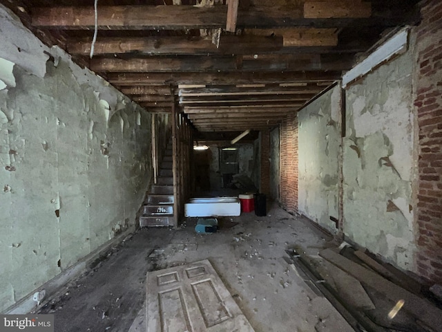 miscellaneous room featuring brick wall