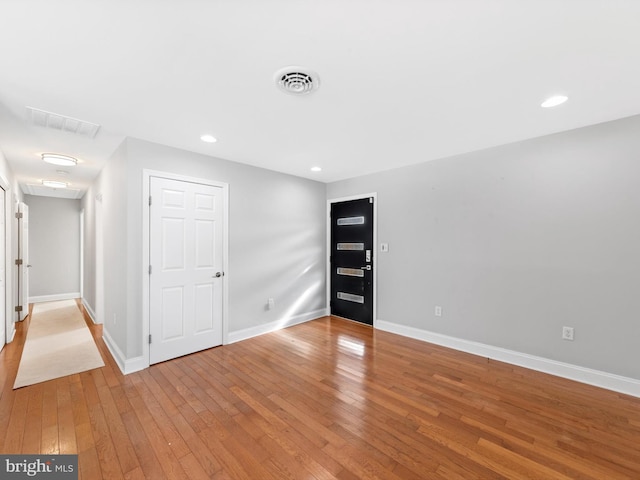 unfurnished room featuring light wood-type flooring