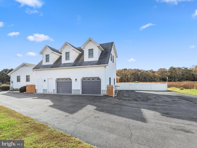 view of side of home with a garage