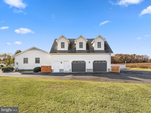 view of property exterior featuring a garage and a yard