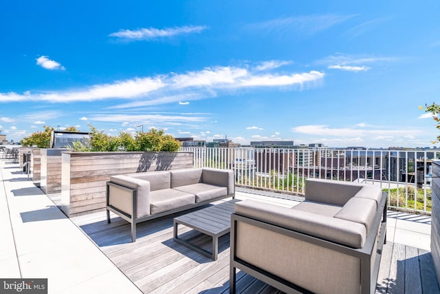 deck featuring outdoor lounge area