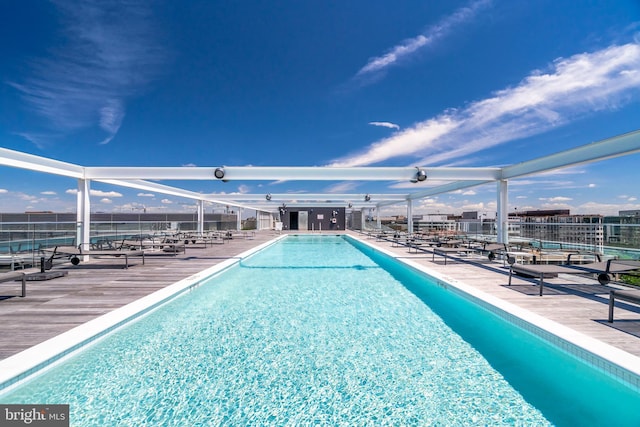 view of pool featuring a patio