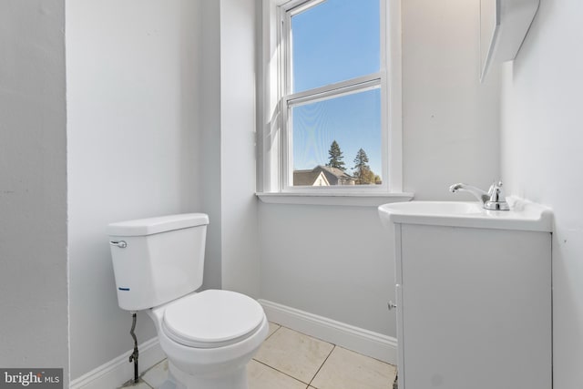 bathroom featuring tile patterned flooring and toilet