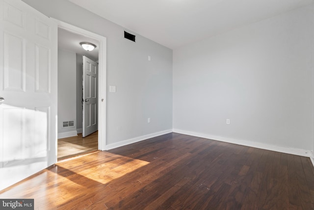 1826 Brunswick Ave, Lawrence Township, NJ 08648 - spare room with dark wood-style floors and baseboards