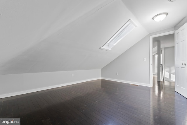 1826 Brunswick Ave, Lawrence Township, NJ 08648 - additional living space with vaulted ceiling, a skylight, dark wood-style flooring, and baseboards